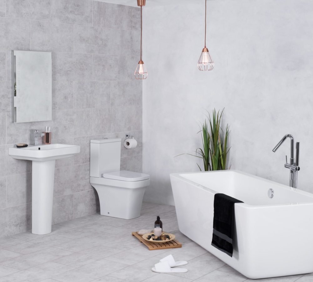 A modern bathroom with a toilet and bathtub